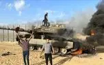 برای دیدن لحظه انفجار مخزن اسرائیل توسط جنگجو فلسطینی