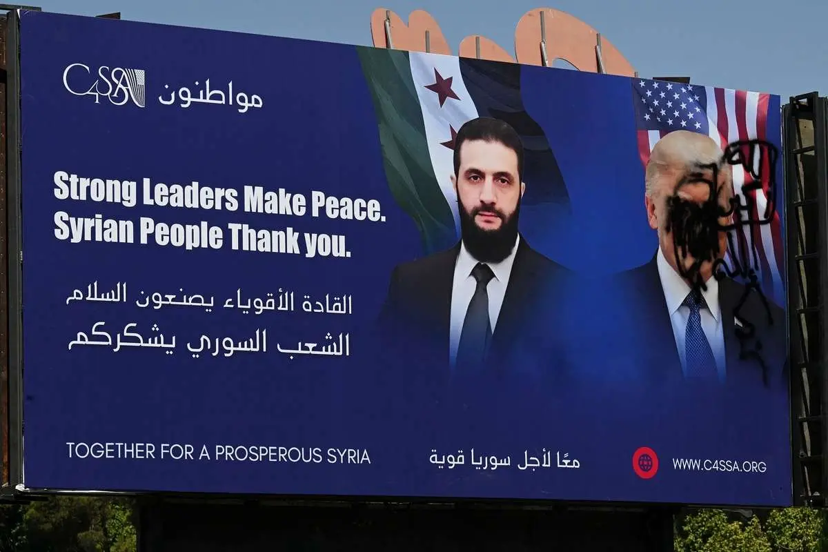 عکس توزیع تصویر دونالد ترامپ در کمیته تبلیغاتی در دمشق 4 عکس توزیع تصویر دونالد ترامپ در کمیته تبلیغاتی در دمشق