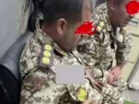 افرادی با لباس های نظامی با پرچم های شیر و خورشید در مترو تهران دستگیر شدند