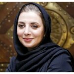 نوزاد رویایی میرعلمی در آغوش پدرش است