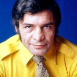 (عکس) تمرین بیک ایمانوردی با دمبل در خانه، دهه 40