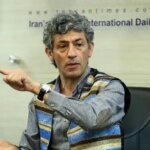 سیروس همتی در کنار همسر و دوقلوهایش