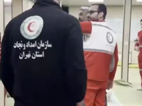 برای دیدن؛ پژمان جمشیدی با لباس هلال احمر در حال آفتاب گرفتن