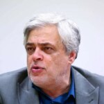 مهاجری: انتخابات را به تعویق بیندازید