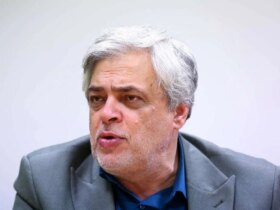 مهاجری: انتخابات را به تعویق بیندازید